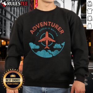 Alt Text: Funny adventurer sweatshirt featuring the phrase The World Is Waiting For Travelers with a plane graphic.