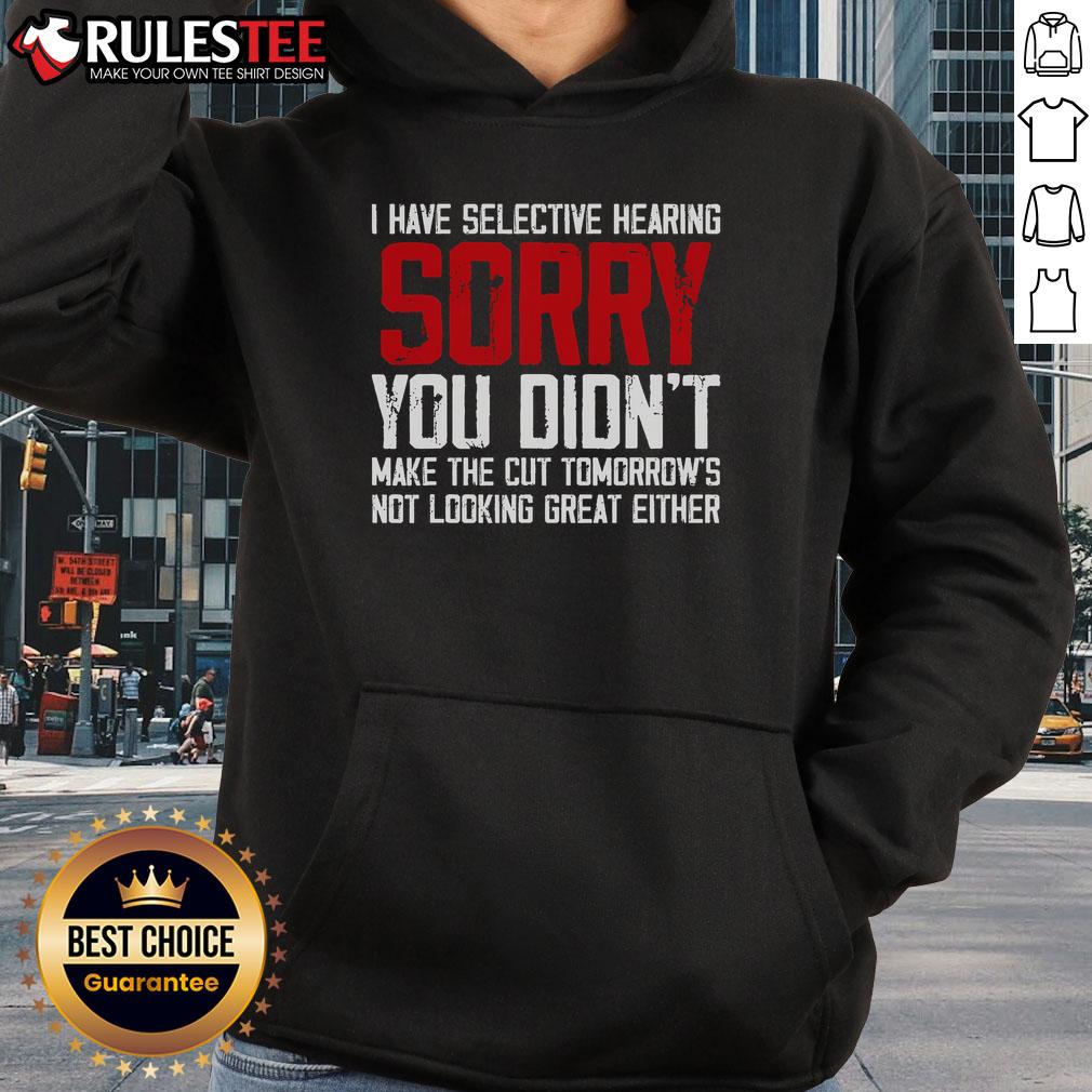 Funny cat with selective hearing wearing a hoodie, ignoring commands and looking adorable in this humorous moment.
