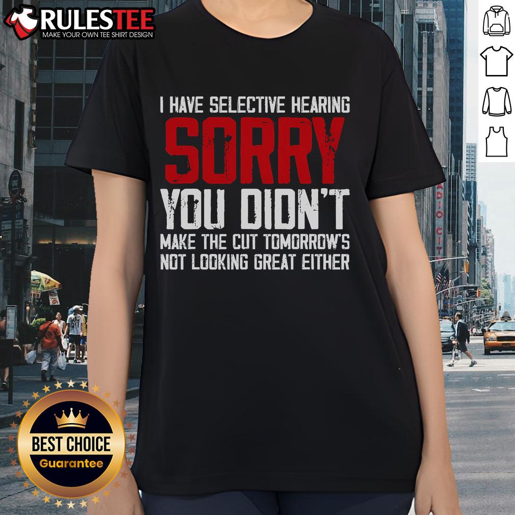 Funny cat with selective hearing, playfully ignoring a lady, perfect for a humorous tee design.