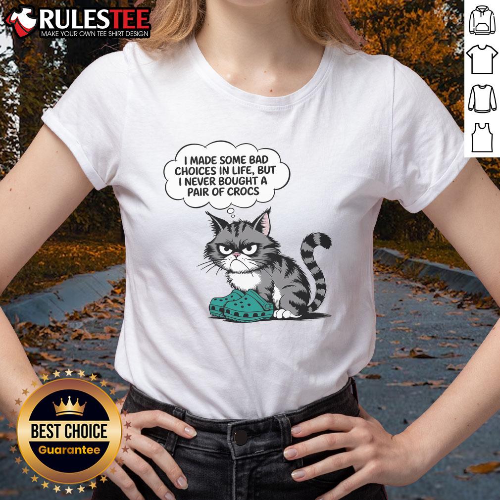 Funny cat wearing a tee with text about bad life choices, emphasizing I never bought a pair of Crocs humor.