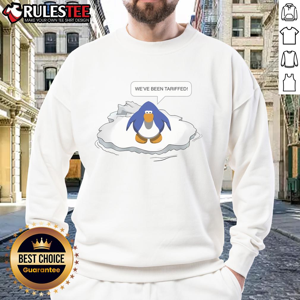 Alt Text: Funny Club Penguin 'We've Been Tariffed' sweatshirt featuring a playful design and vibrant colors for fans.