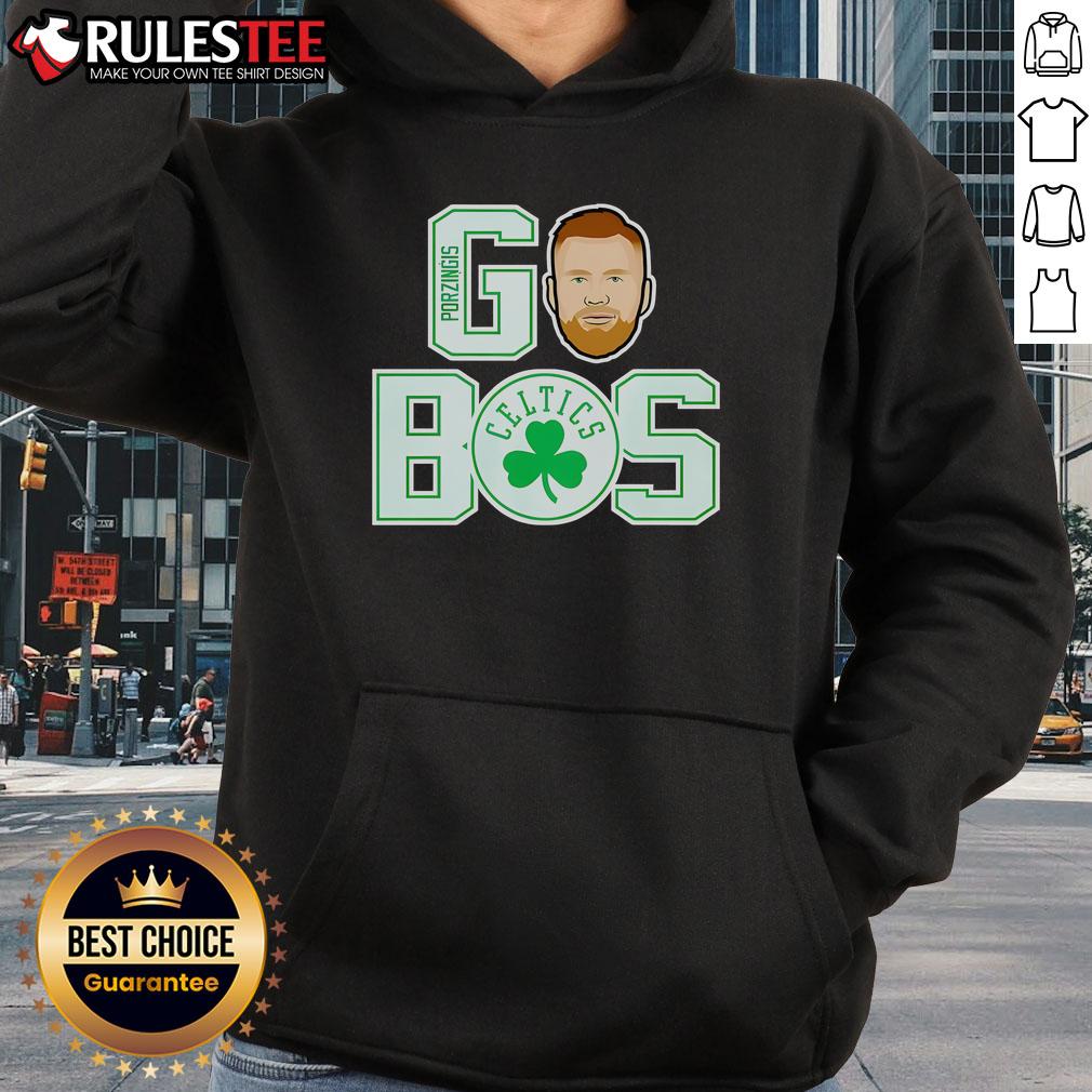 Kristaps Porzingis wearing a Boston Celtics hoodie, showcasing team spirit and style in a vibrant design.