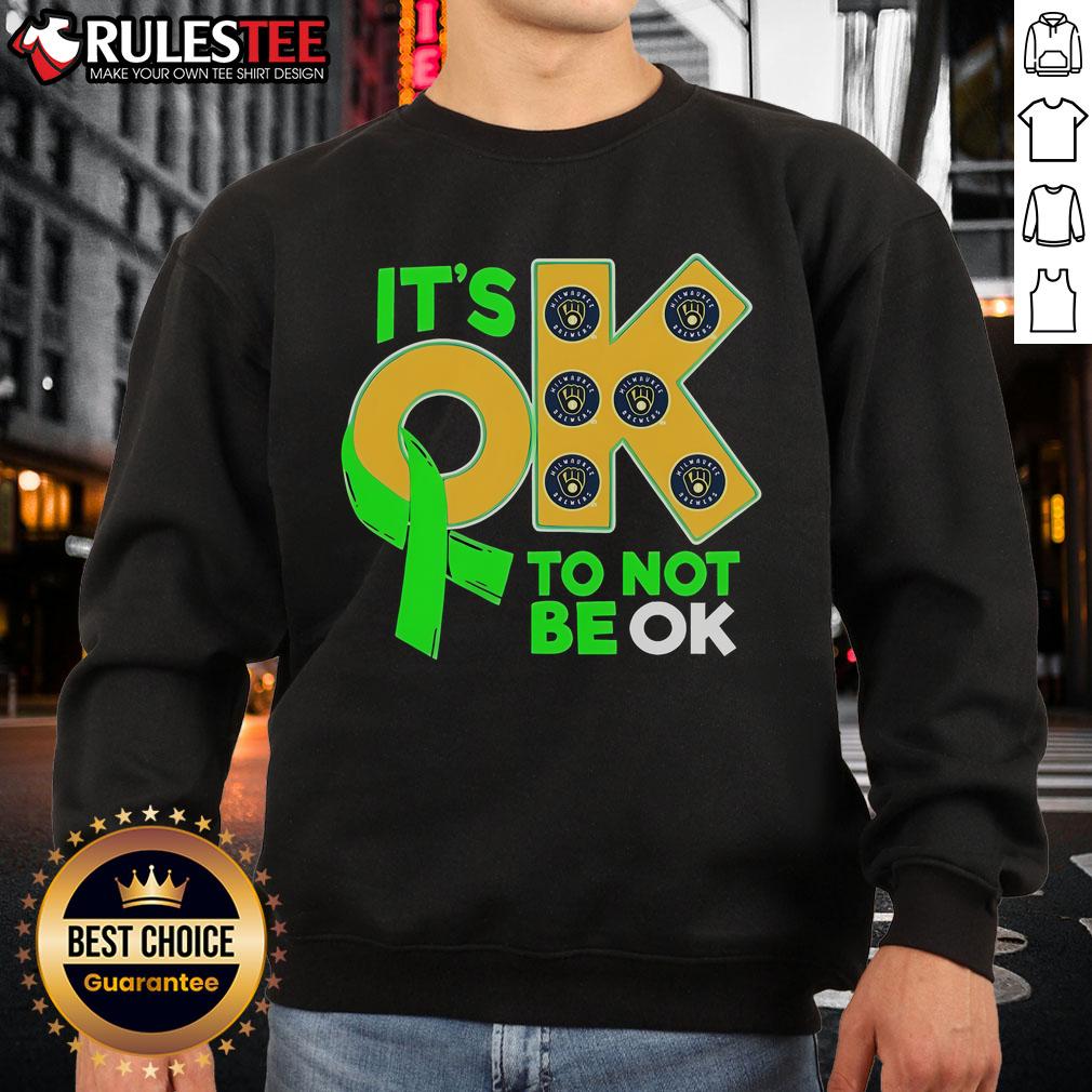 Nice Milwaukee Brewers 'It's Ok To Not Be Ok' sweatshirt featuring team logo and stylish design for fans.