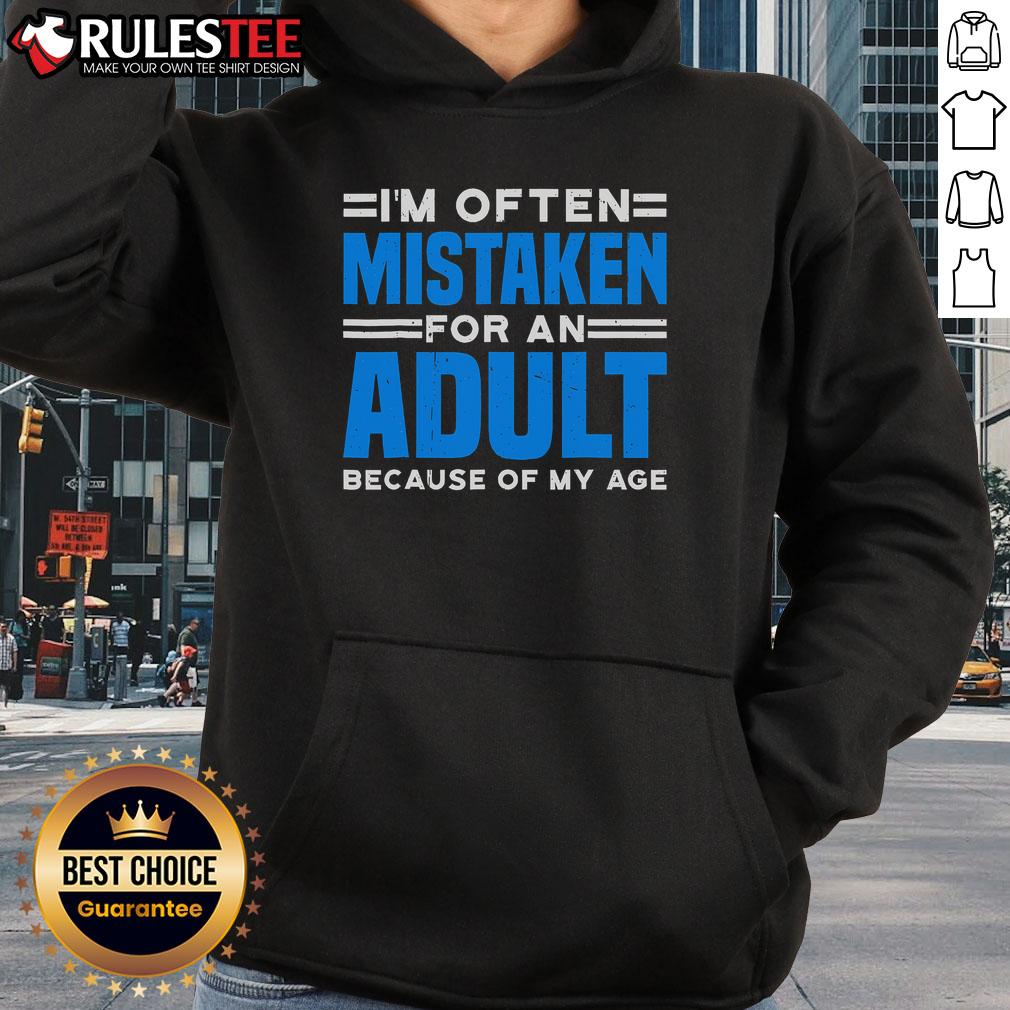 Cozy 'Official I'm Often Mistaken For An Adult Because Of My Age' hoodie in a casual setting, perfect for all ages.