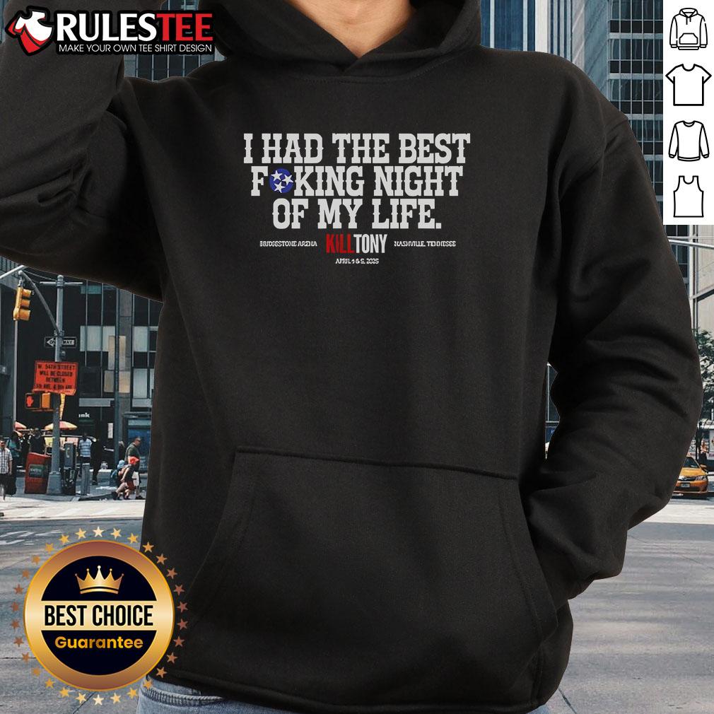 Person wearing a 'Top Kill Tony Nashville Best Night of My Life' hoodie, celebrating at a live comedy event.