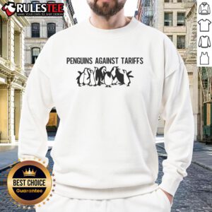 Funny sweatshirt featuring a meme of top penguins sarcastically commenting on tariffs. Perfect for humor lovers!