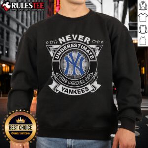 Cozy New York Yankees sweatshirt showcasing team pride, perfect for fans who never underestimate the power of the Yankees.