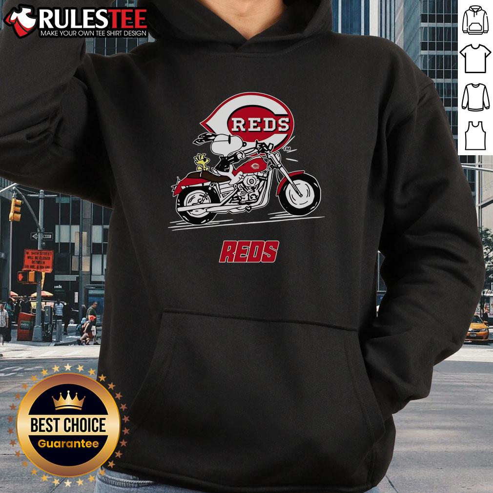 Alt Text: Awesome Snoopy and Woodstock driving motorbike on Cincinnati Reds hoodie, perfect for fans and casual wear.