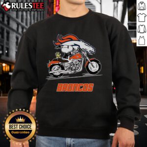 Alt Text: Snoopy and Woodstock riding a motorbike in a Denver Broncos sweatshirt, showcasing a fun and stylish design.
