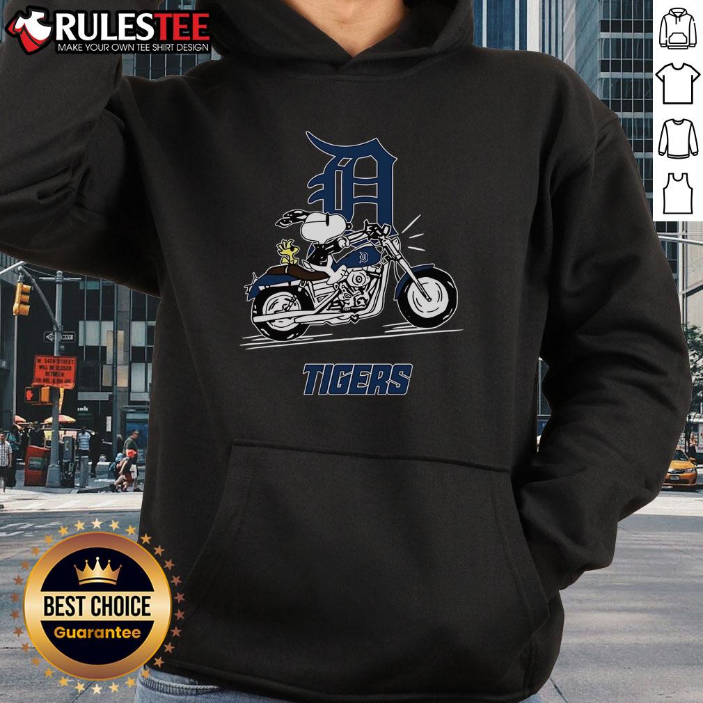 Alt Text: Awesome Snoopy and Woodstock driving motorbike on Detroit Tigers hoodie design, perfect for fans and cozy wear.