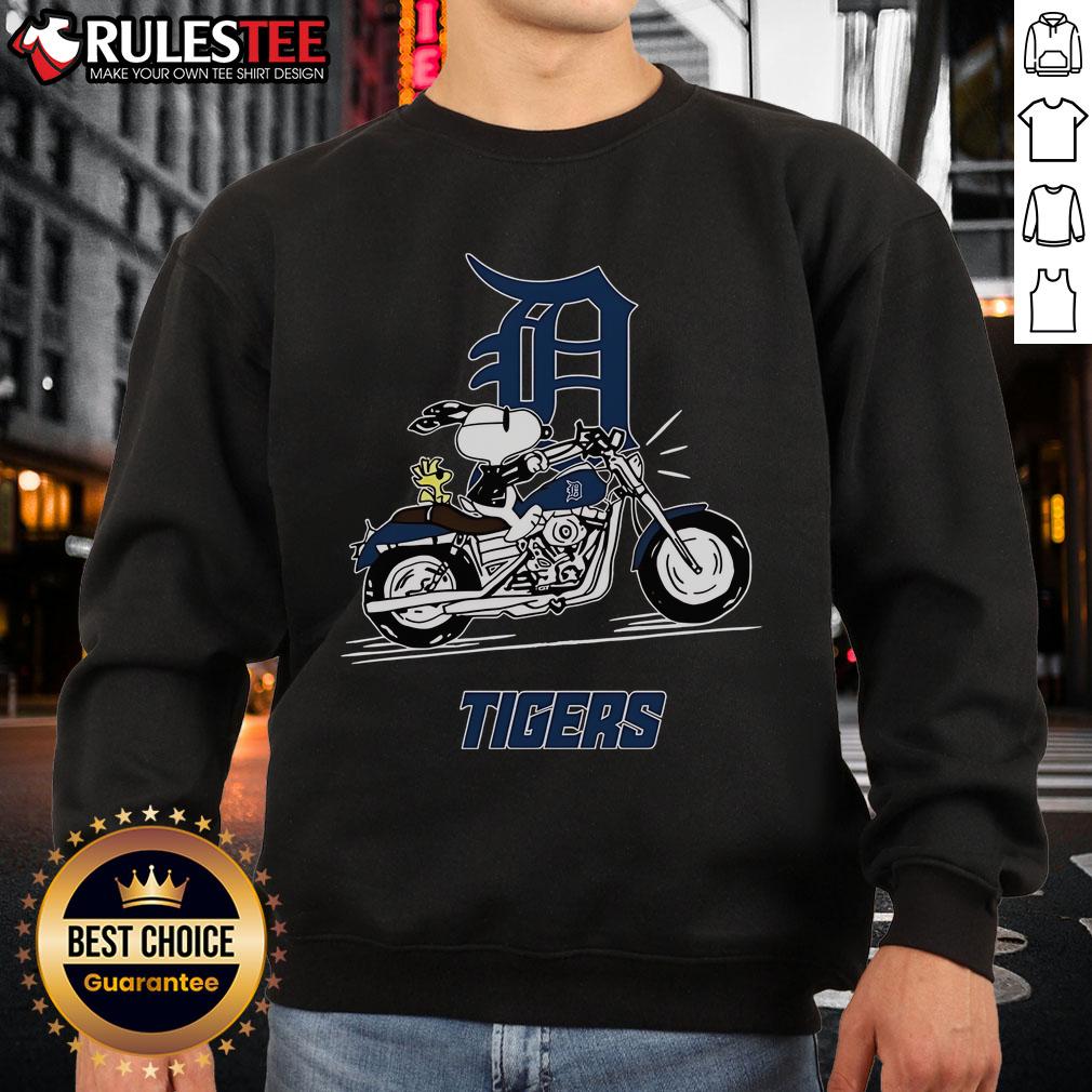 Alt Text: Awesome Snoopy and Woodstock driving a motorbike graphic on a Detroit Tigers sweatshirt for fans and collectors.
