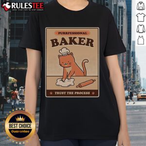 Alt Text: Cute cat wearing a chef hat and apron, showcasing the 'Purrfessional Baker' tee design for ladies. Trust the process!