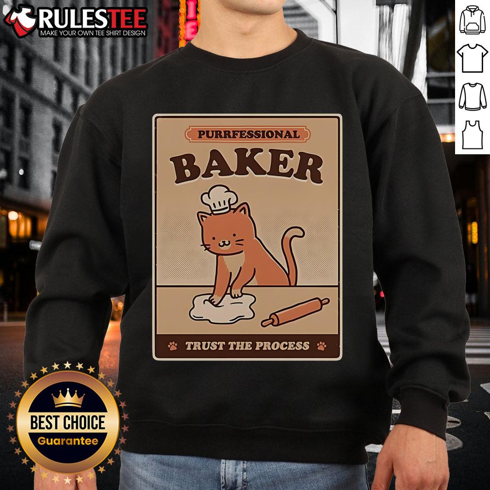 Alt Text: Cute cat in a chef hat baking, wearing 'Purrfessional Baker' sweatshirt, perfect for cat lovers and baking enthusiasts.