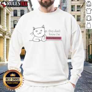 Cute cat wearing a 'They Don't Know I'm Soushiyo' sweatshirt, showcasing playful charm and cozy style.