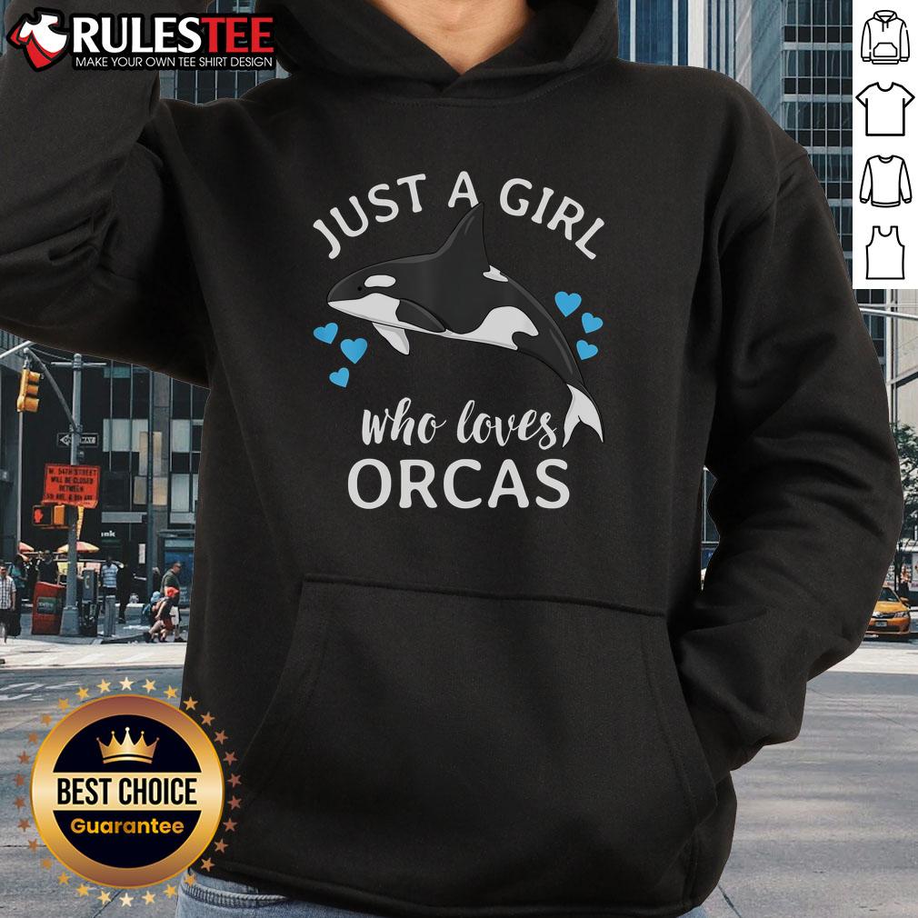 Cute girl wearing a hoodie with orcas, showcasing her love for killer whales and the ocean.
