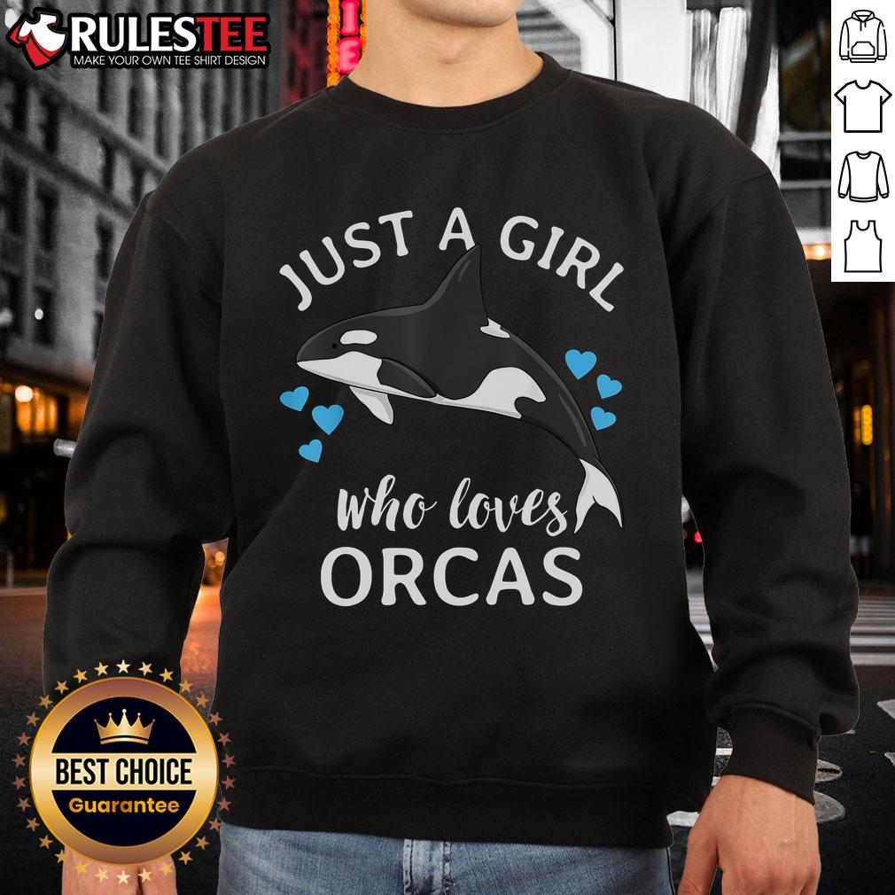Alt Text: Cute girl wearing a sweatshirt that says Just a Girl Who Loves Orcas with killer whales in a vibrant ocean setting.