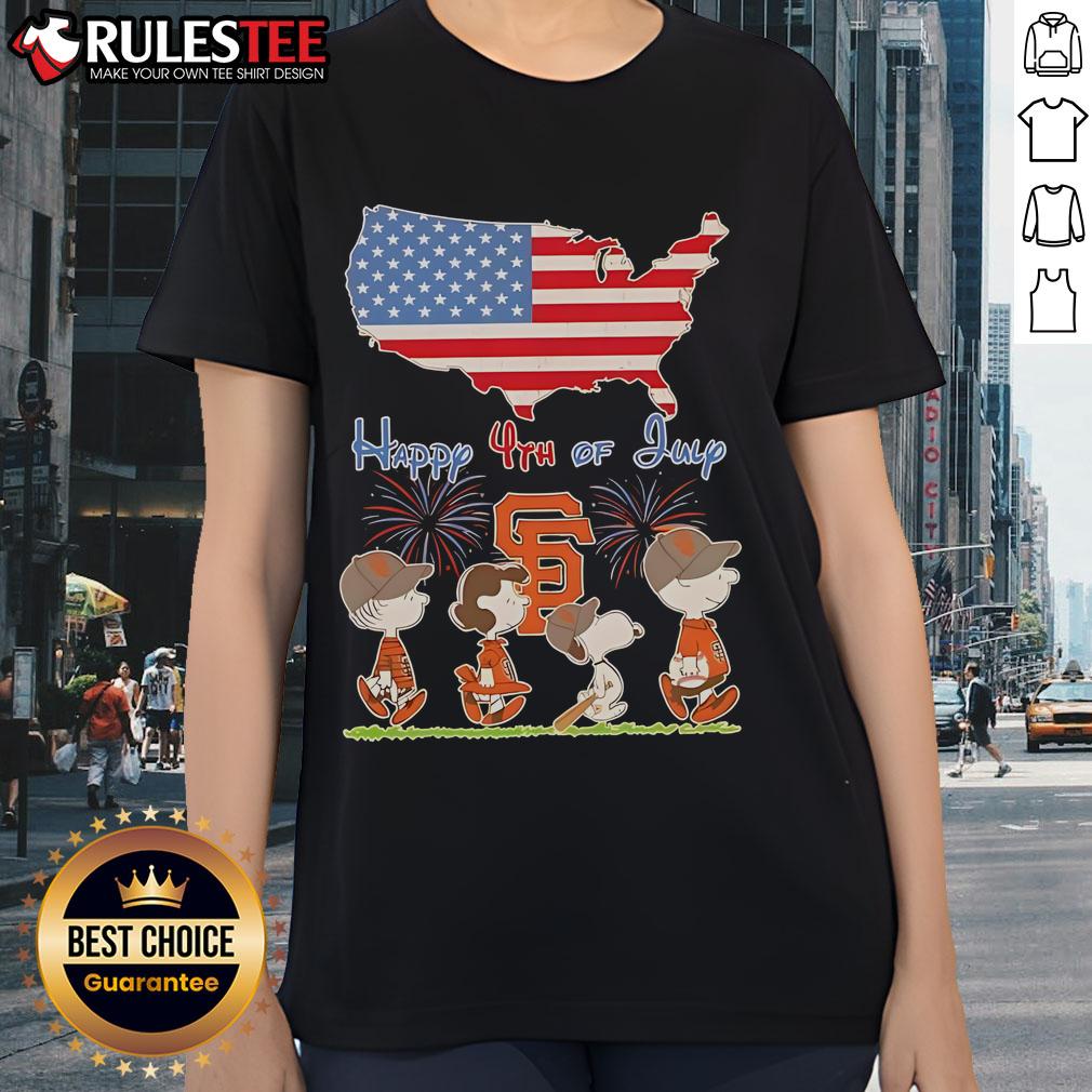 Alt Text: Cute San Francisco Giants tee featuring Snoopy and friends celebrating 4th of July with an American flag design.