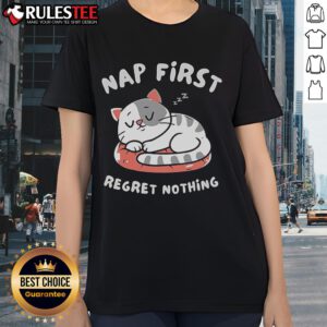 Alt Text: Cute cat napping on a pastel background, featured on a First Regret Nothing ladies tee design.