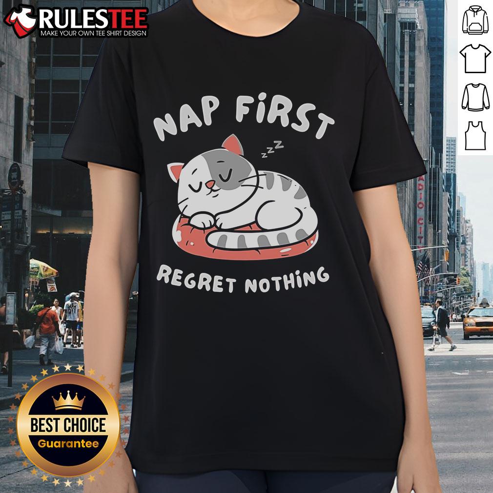 Alt Text: Cute cat napping on a pastel background, featured on a First Regret Nothing ladies tee design.