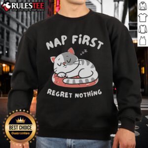 Cute cat napping in cozy 'First Regret Nothing' sweatshirt, showcasing comfort and style for cat lovers.