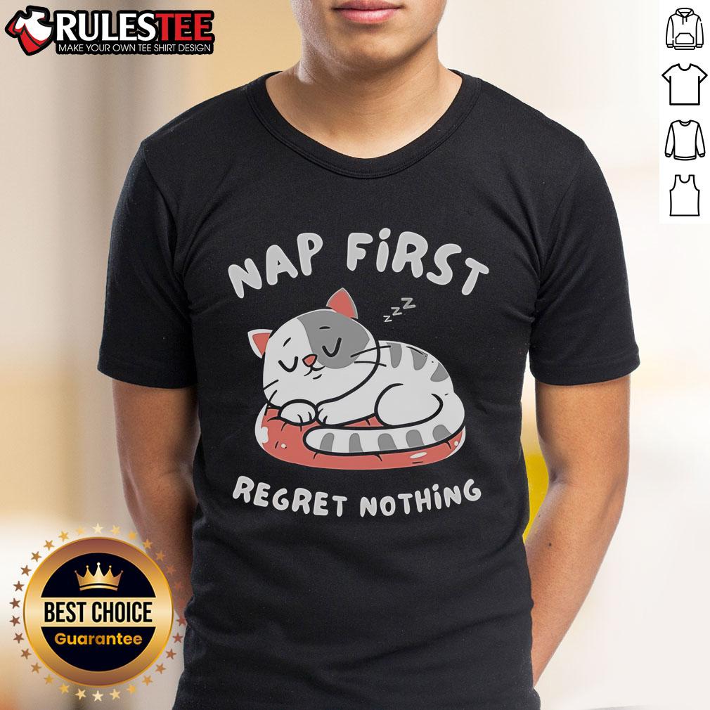Cute cat napping on a cozy blanket, featuring the phrase First Regret Nothing on a trendy T-Shirt. Perfect for cat lovers!