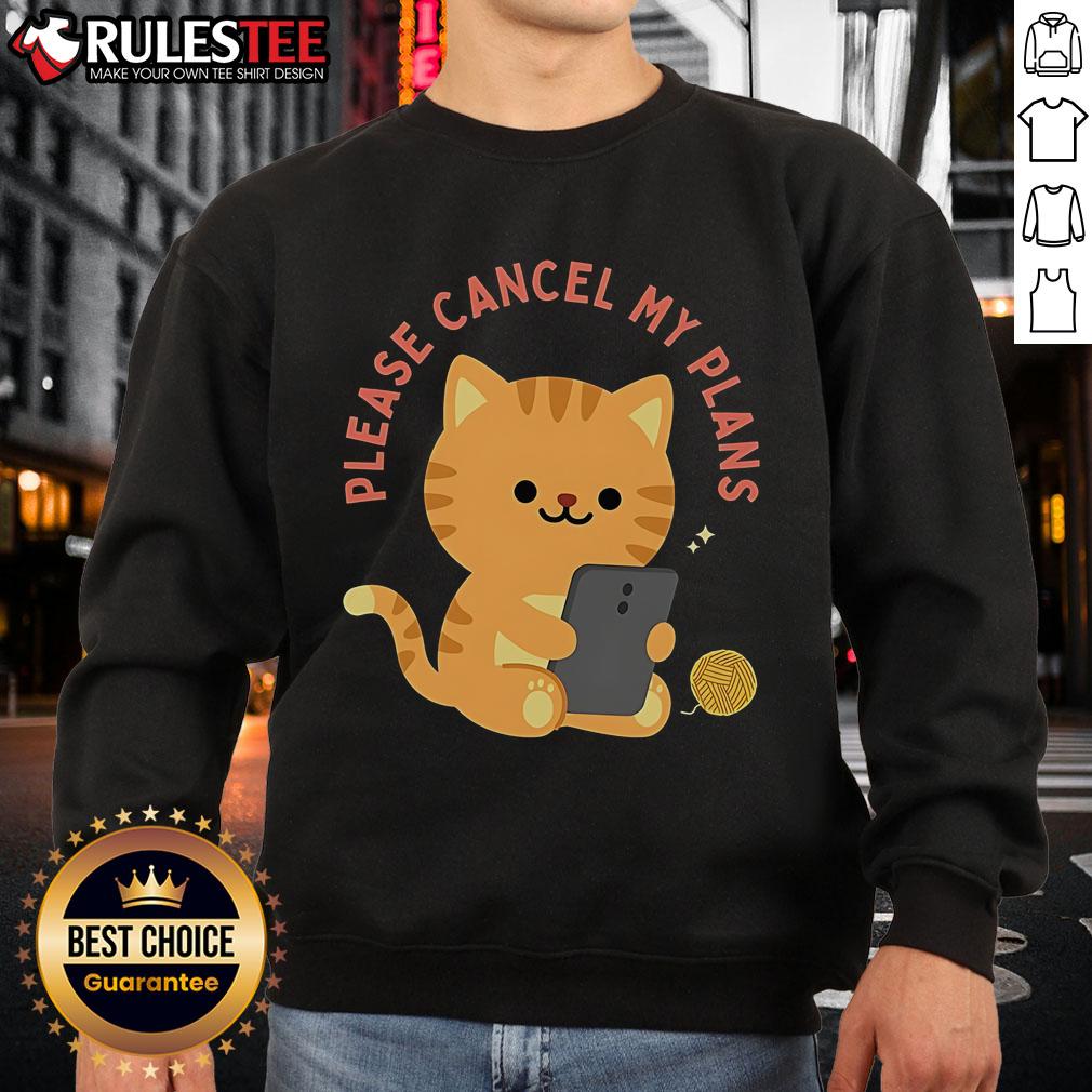 Alt Text: Adorable cat on a cozy 'Please Cancel My Plans' sweatshirt, perfect for cat lovers and loungewear enthusiasts.