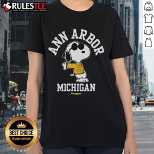 Alt Text: Cute Snoopy Ann Arbor Michigan 2025 Tour Ladies Tee featuring vibrant design, perfect for fans and casual wear.