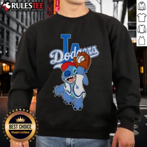 Cute Stitch character wearing a Los Angeles Dodgers sweatshirt while playing baseball, perfect for fans and collectors.