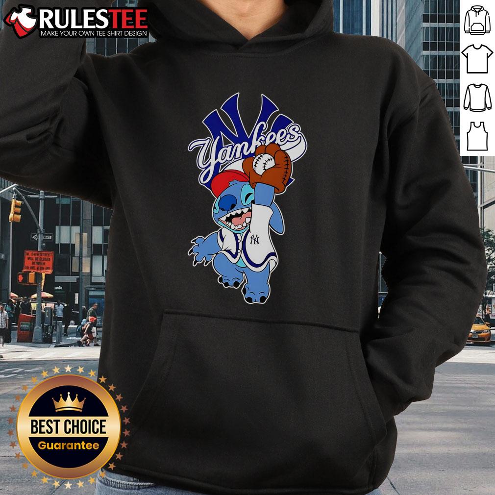 Cute Stitch wearing a New York Yankees hoodie while playing baseball, showcasing adorable sports fashion.
