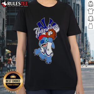 Cute Stitch playing baseball in a New York Yankees ladies tee, perfect for fans and casual wear.
