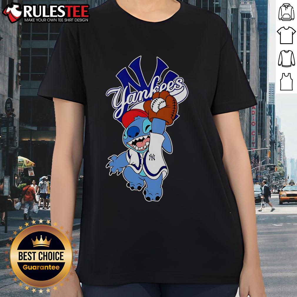 Cute Stitch playing baseball in a New York Yankees ladies tee, perfect for fans and casual wear.