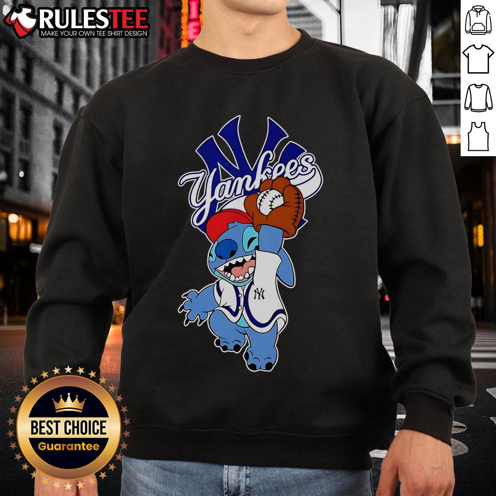 Alt Text: Cute Stitch wearing a New York Yankees sweatshirt while playing baseball, showcasing a fun sports vibe.