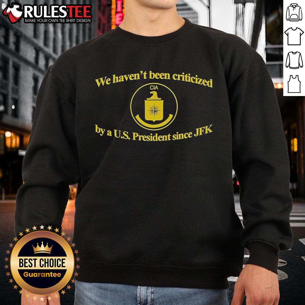 Funny CIA sweatshirt with slogan: 'We Haven't Been Criticized By A US President Since JFK' in bold text.
