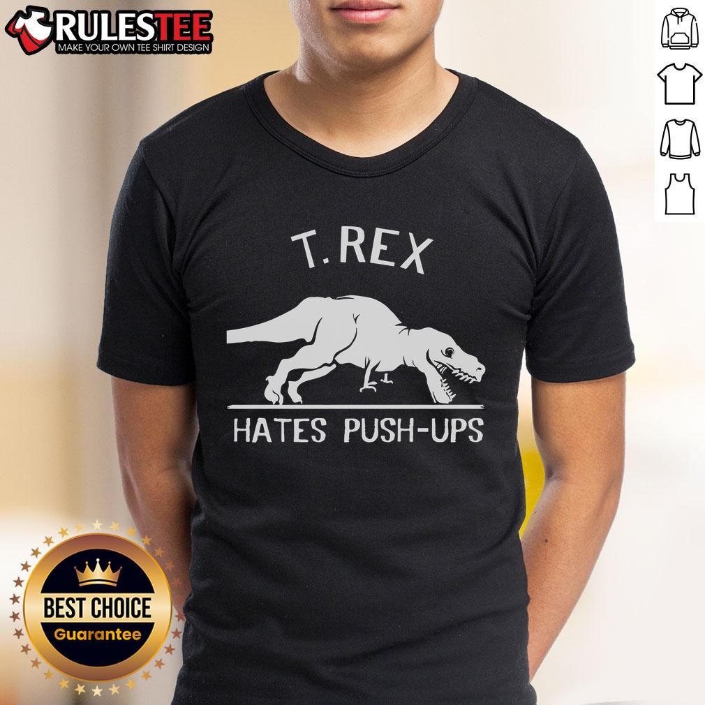 Funny T-Rex Hates Pushups T-Shirt featuring a cartoon Tyrannosaurus Rex displaying a humorous expression. Perfect for dino lovers!