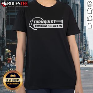 Alt Text: Nice Turnquist Custom Fig Belts logo on a stylish ladies tee shirt, perfect for casual wear and fashion enthusiasts.
