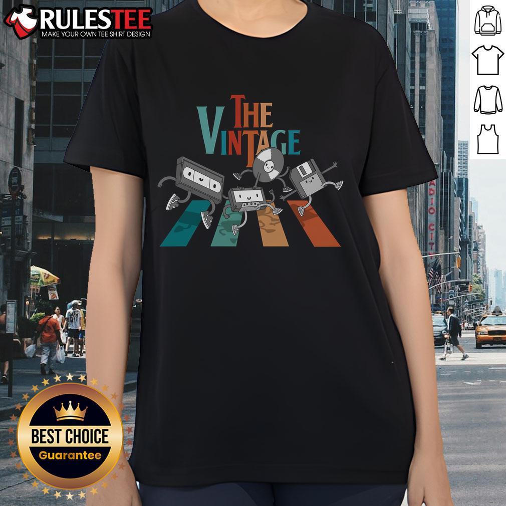 Premium Abbey Road Vintage Tape Ladies Tee featuring a stylish design inspired by classic music aesthetics.