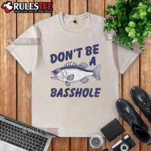 Alt Text: Humorous 'Don't Be A Basshole' fishing bass fish joke printed on a washed t-shirt, perfect for fishing enthusiasts.