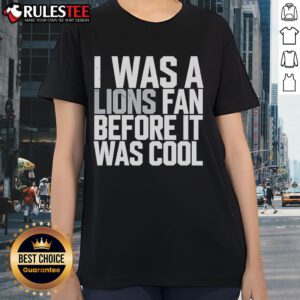 Alt Text: Good Detroit Lions I Was A Lions Fan Before It Was Cool Ladies Tee showcasing team pride and stylish design.