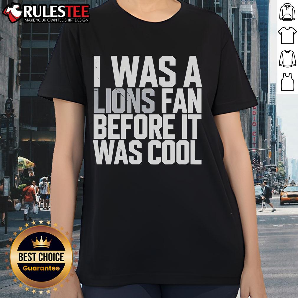 Alt Text: Good Detroit Lions I Was A Lions Fan Before It Was Cool Ladies Tee showcasing team pride and stylish design.