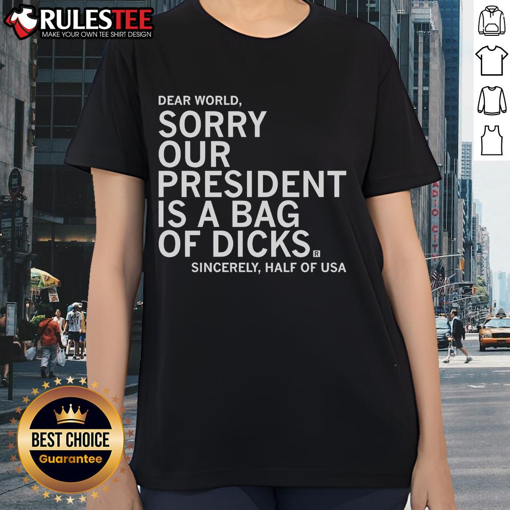 Nice Jamie Bonkiewicz wearing our 'President is a Bag of Dicks' ladies tee, showcasing a bold graphic design and casual style.