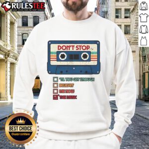 Alt Text: Official 'Don't Stop The Music' cassette tape graphic on a retro vintage sweatshirt, perfect for music lovers.