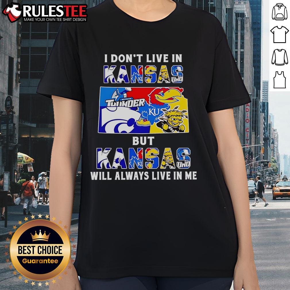 Official 'I Don't Live in Kansas But Kansas Will Always Live in Me' sport teams ladies tee showcasing Kansas pride.