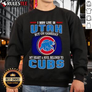 Cozy sweatshirt featuring 'I May Live In Utah But On Gameday My Heart And Soul Belongs To Chicago Cubs' design.