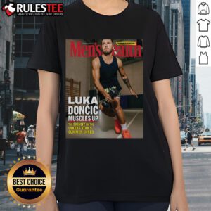 Luka Doncic showcasing muscles in a stylish Lakers tee, perfect for summer sports fans and apparel enthusiasts.