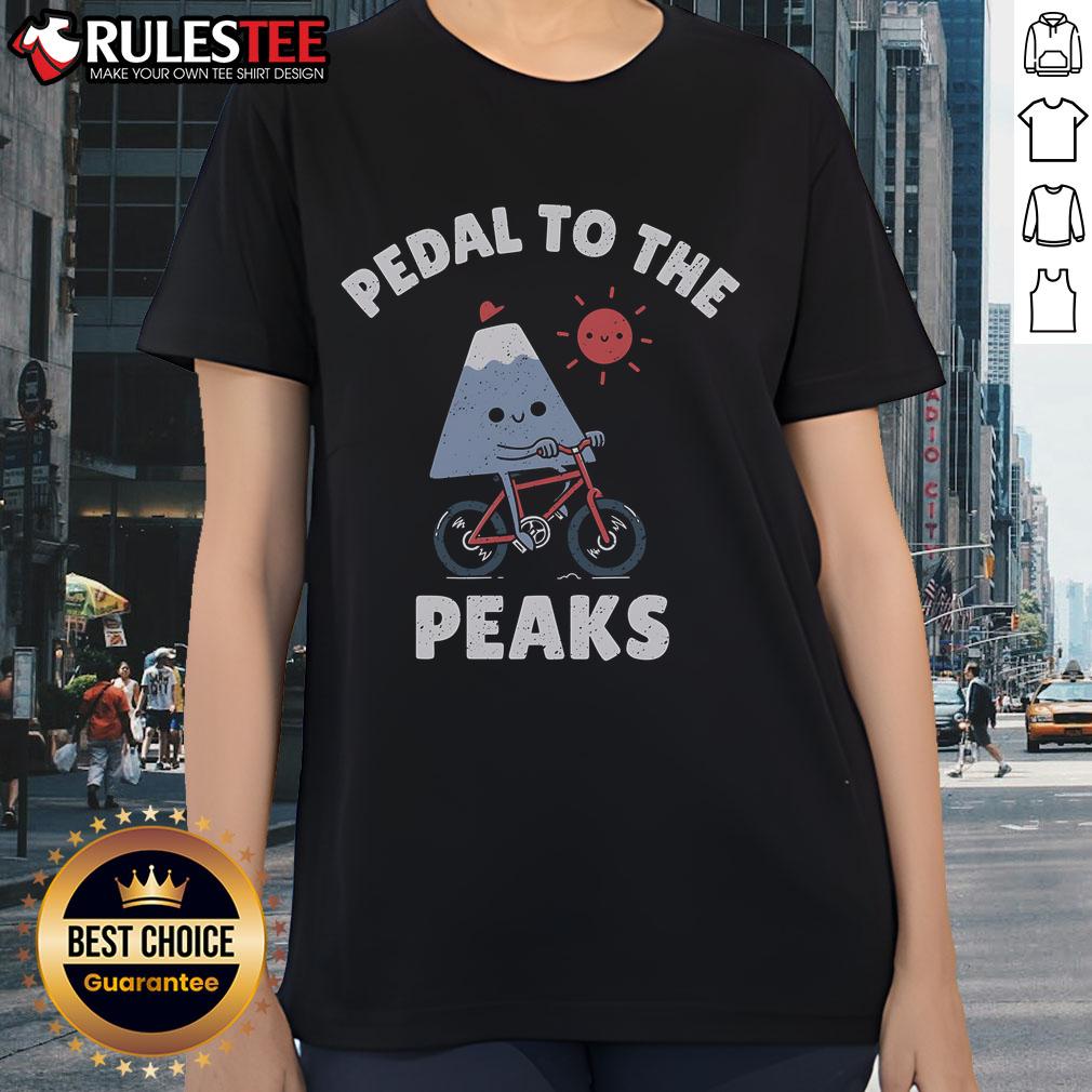 Top Pedal To The Peaks Ladies Tee featuring a stylish mountain graphic, perfect for outdoor enthusiasts and casual wear.