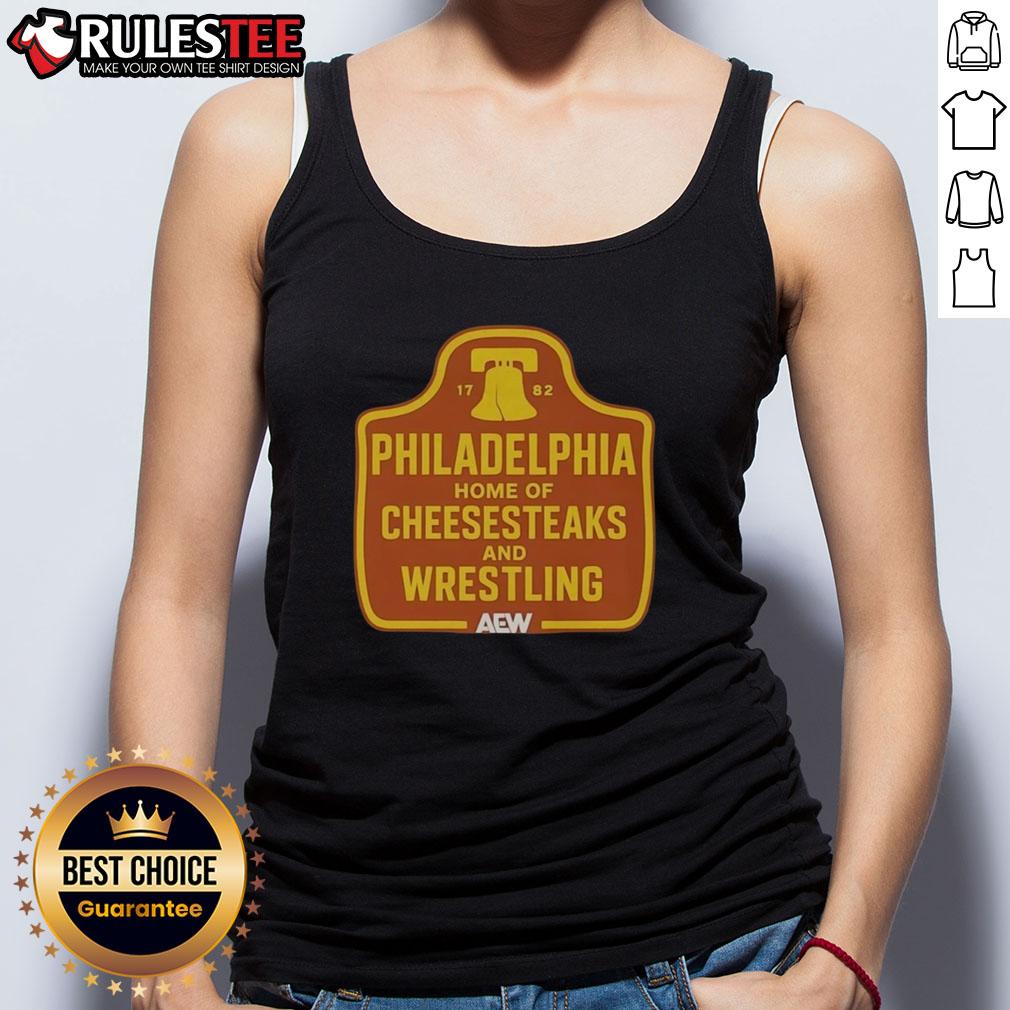Vintage tank top featuring Awesome Philadelphia Home of Cheesesteaks and Wrestling design, perfect for fans and collectors.