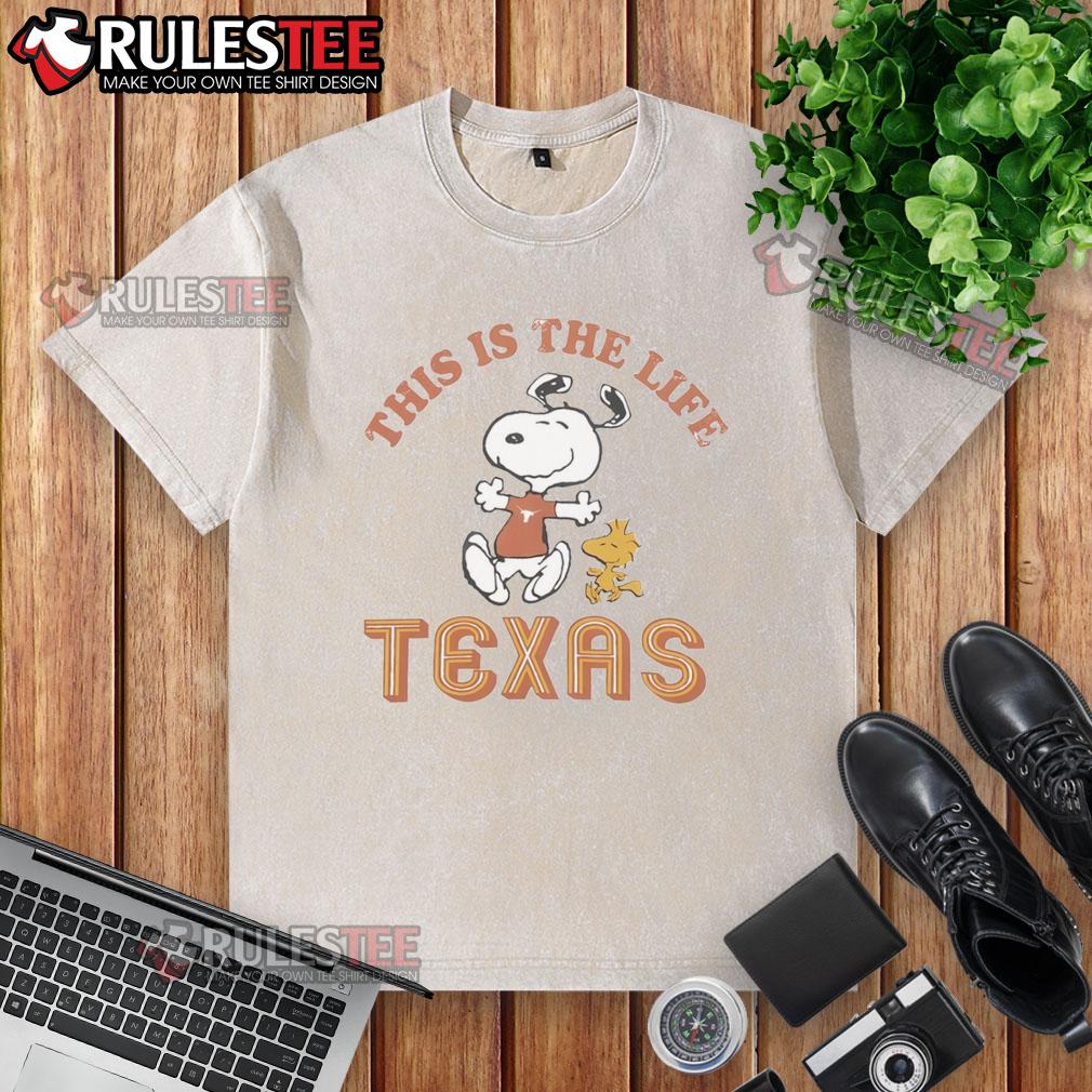 Alt Text: Cute Snoopy Texas Longhorns football washed t-shirt featuring a playful design for fans and casual wear.