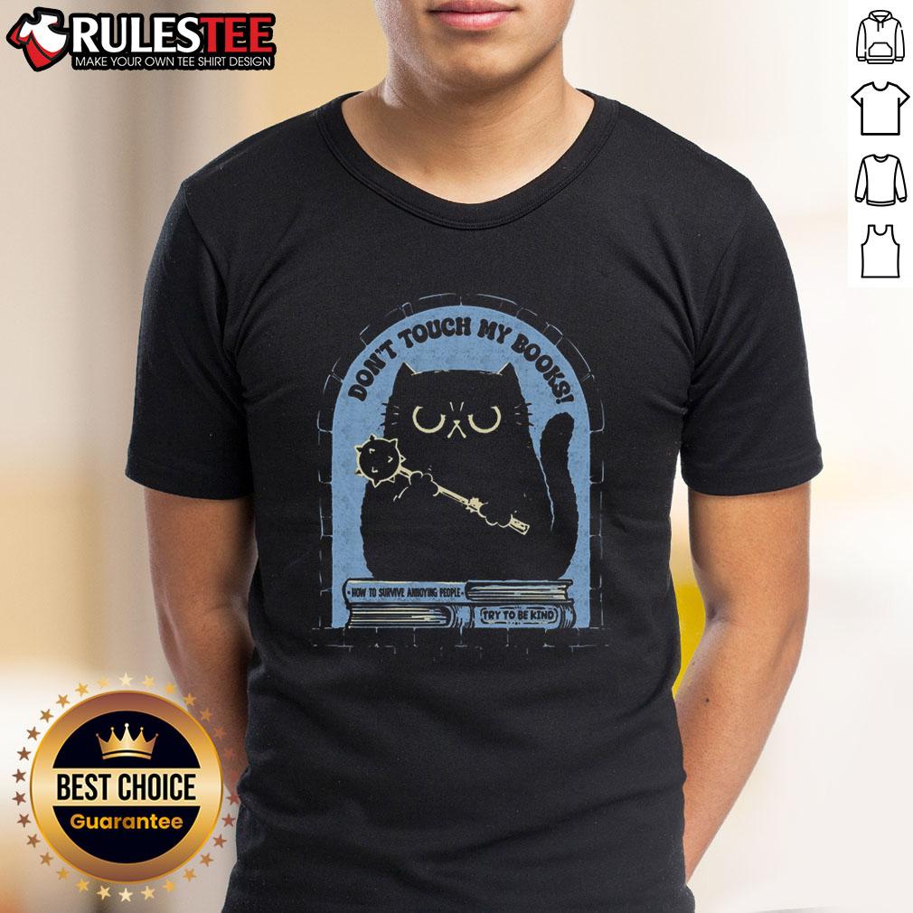Funny cat t-shirt with 'Don't Touch My Books' text, featuring a playful feline surrounded by books, perfect for cat lovers.