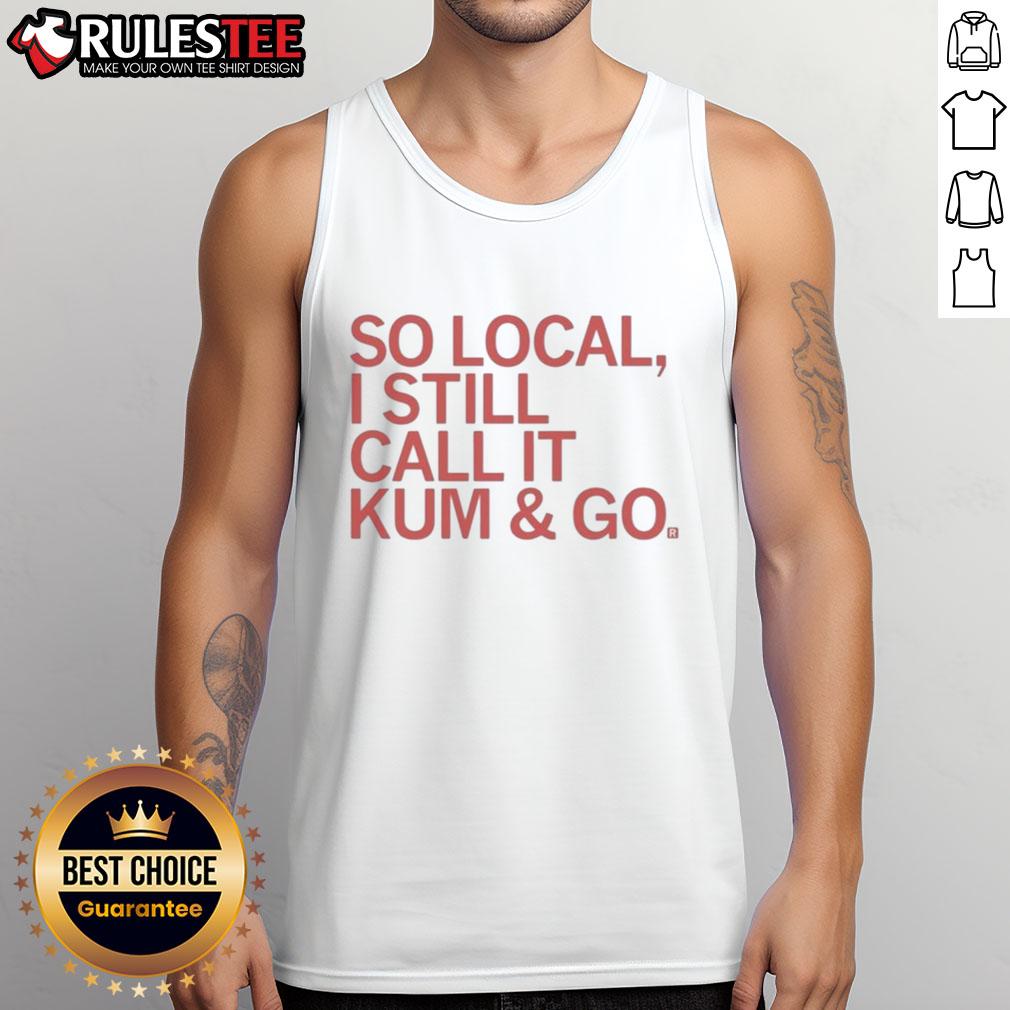 Person wearing a 'Good-So-Local-I-Still-Call-It-Kum-And-Go' tank top, showcasing local pride and casual style.