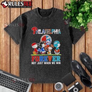 Alt Text: Good The Peanuts Philadelphia Sport Teams logo on a washed t-shirt, celebrating loyalty through wins and losses.